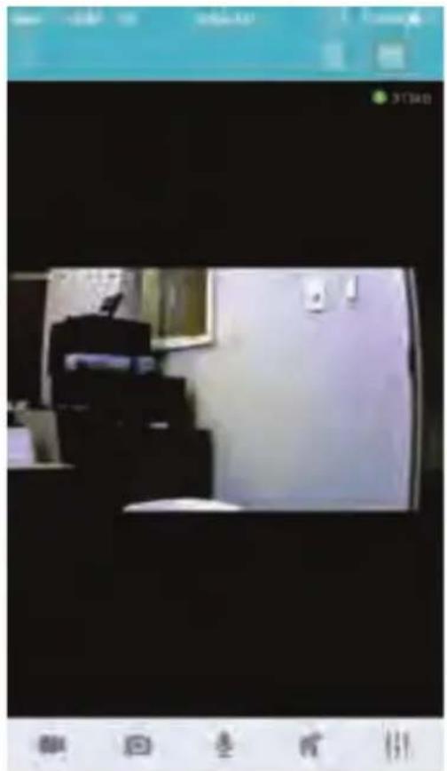 Interior view of a modern kitchen or appliance room with a refrigerator and counter (no visible text or symbols)