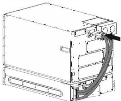Technical line drawing of a mechanical device with internal components and a curved pipe (no text or symbols)