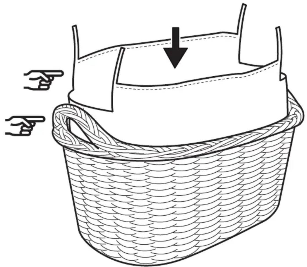 Line drawing of a woven basket with a handle and arrow indicating direction (no text or symbols)