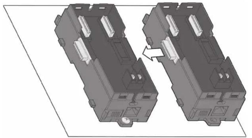 3D diagram of two mechanical components with internal connectors and mounting holes, showing a transformation or assembly (no text or symbols present)