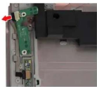 Close-up of a green circuit board component being inserted into a device casing, with a red arrow pointing to the left side (no visible text or symbols).