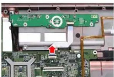 Close-up of a green circuit board with visible components and a red arrow pointing to a component (no text or symbols)