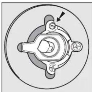 Mechanical component diagram showing a central hub with four surrounding parts and an arrow indicating direction (no text or symbols)