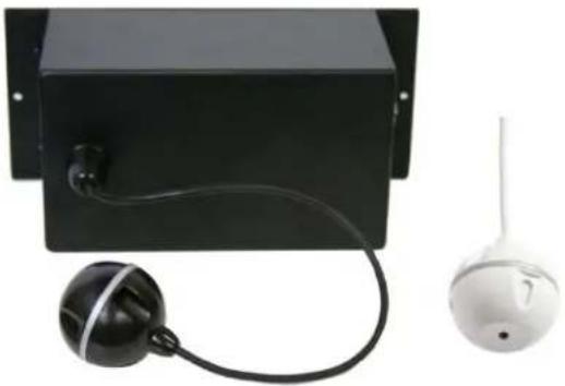 Three electronic devices: a black rectangular box with a bulb, a white spherical device with a pin, and a black circular component (no visible text or symbols)