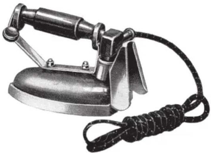 Vintage iron iron with coiled cord and handle (no text or symbols visible)