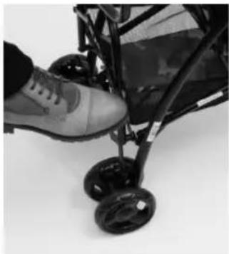 Close-up of a child's foot wearing a stroller with black wheels (no visible text or symbols)