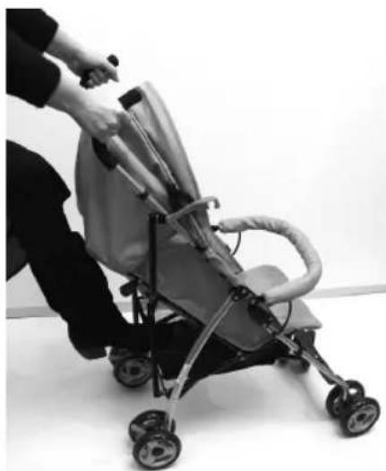 Person pushing a baby stroller with wheels, no visible text or symbols