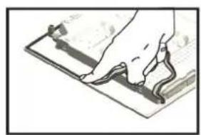 Illustration of a hand using a pen to write on a sheet of paper (no text or symbols visible)