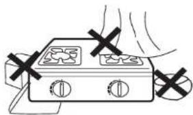 Simple line drawing of a portable appliance with two fans and a handle, no text or symbols present