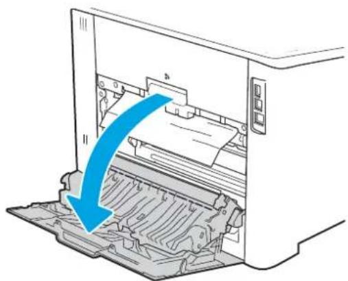 Diagram of a printer's internal structure with a blue arrow indicating the process (no text or symbols present)