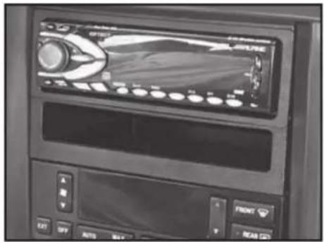 Interior view of a car dashboard with control panel and display (no visible text or symbols)