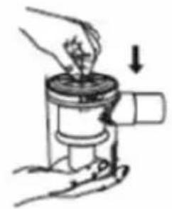 Illustration of a hand using a mechanical device to press or install a component (no text or symbols visible)