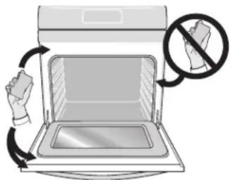 Diagram showing a hand removing a device into an oven with a prohibition symbol