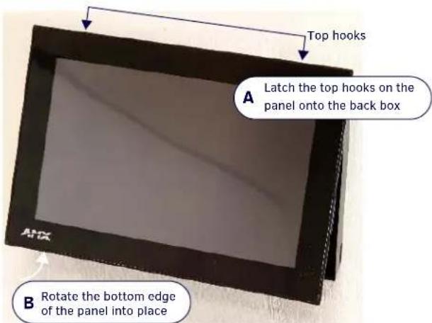 Top hooks A Latch the top hooks on the panel onto the back box B Rotate the bottom edge of the panel into place