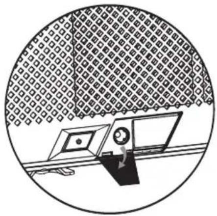 Simple line drawing of a person operating a computer with monitor and keyboard, enclosed in a circle (no text or symbols)