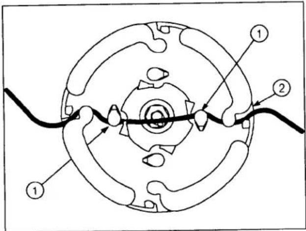 Technical diagram of a mechanical component with labeled parts 1 and 2, showing internal structure and connection lines.