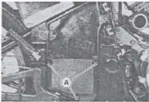 Close-up of an aircraft fuselage with visible structural components and no readable text or symbols