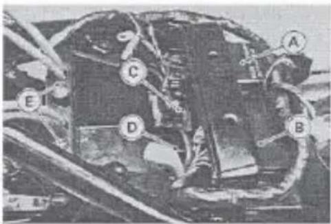 Black-and-white photo of a mechanical or industrial component with labeled parts A, B, C, D, and E.