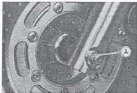 Close-up of a mechanical component with circular features and a labeled point A (no readable text or symbols)
