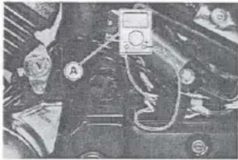 Close-up of a mechanical component with labeled parts (no readable text or symbols)