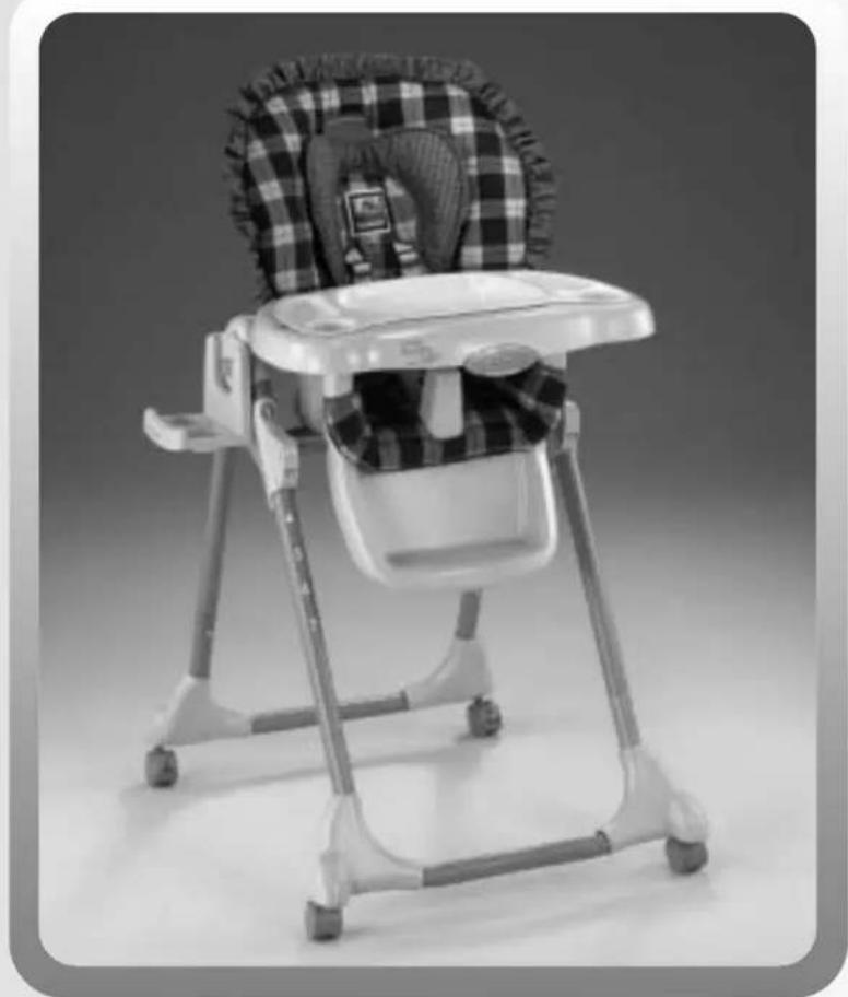 Black and white photo of a baby boom chair with plaid backrest and matching seat (no text or symbols visible)