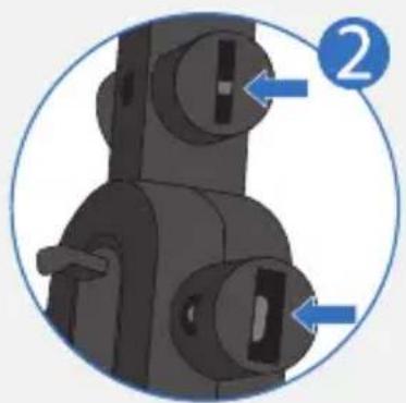 Close-up of a mechanical component with circular ports and two blue arrows pointing to features (no text or symbols)