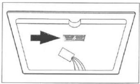 Simple line drawing of a container with an arrow pointing to a textured surface and a tag attached (no text or symbols)