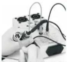 Close-up of electronic components with wires and connectors (no visible text or symbols)