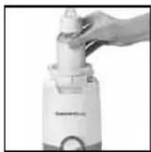 Close-up of a hand pressing down on a white cylindrical object (no visible text or symbols)