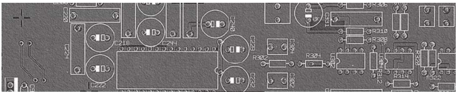 Close-up of a printed circuit board with various electronic components and connectors (no readable text or symbols)