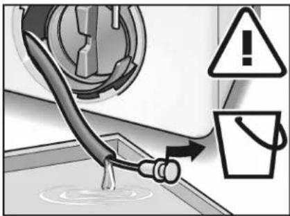 Diagram showing a pipe being inserted into a washing machine with warning symbols and labels
