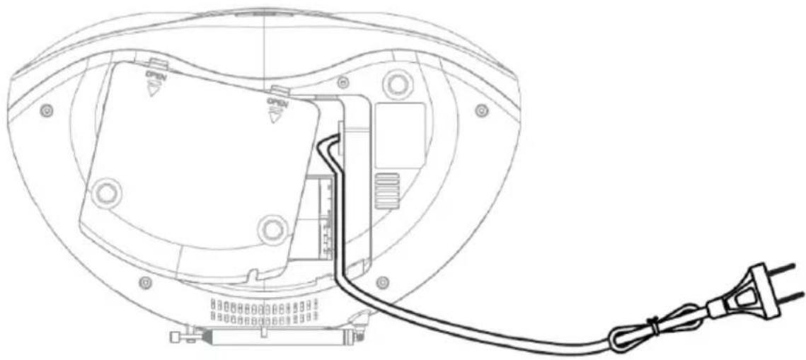 Technical line drawing of an electronic device with a cable inserted, showing internal components and wiring (no text or symbols)