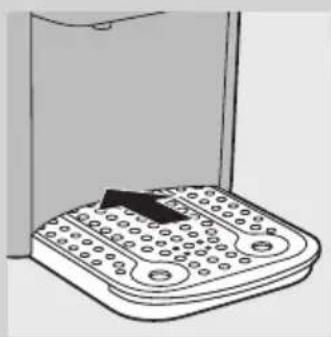 Line drawing of a handheld electronic device with a black clip attached to the top panel (no text or symbols).