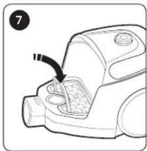 Line drawing of a vacuum cleaner with a hand pointing to the interior (no text or symbols)