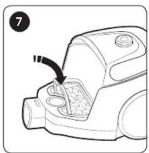 Line drawing of a vacuum cleaner's internal component with a curved arrow indicating motion (no text or symbols)