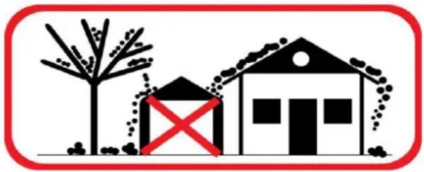 Simple line drawing of a barn and a house with a red X mark, no text or symbols present