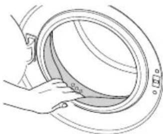 BEKO WRE6511WBD - Cleaning the loading door and the drum - 2