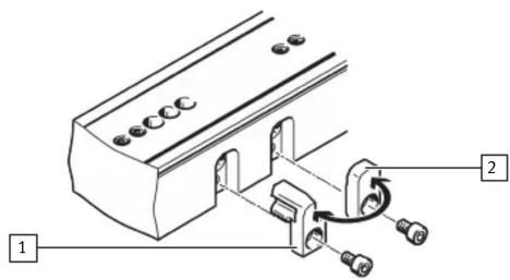 Technical diagram showing a mechanical assembly with labeled parts 1 and 2, including bolts and a clamp mechanism.