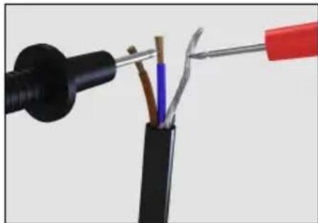 Close-up of a black electrical plug with exposed wires and a red terminal, no text or symbols visible