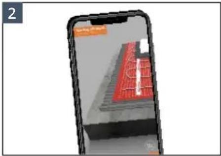 Smartphone displaying a 3D architectural model with red structural elements, no visible text or symbols on the device itself.