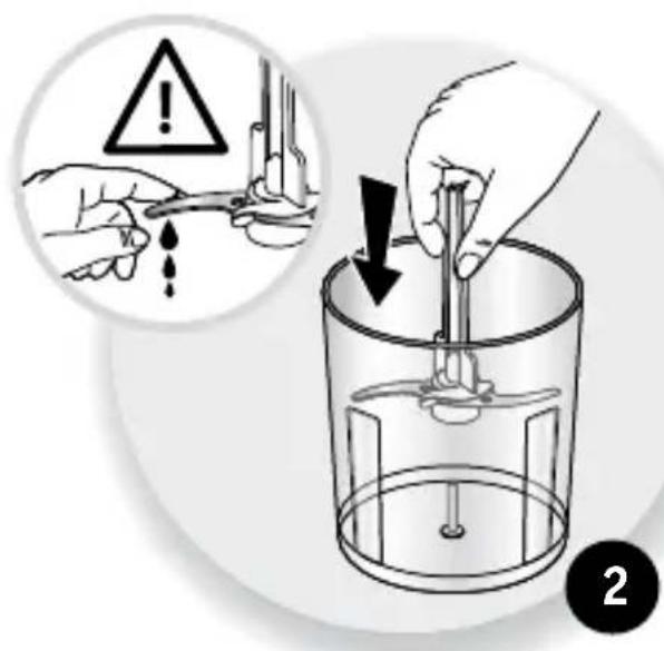 Diagram illustrating a mechanical process with warning symbols and a magnified view of the tool being inserted into a container.