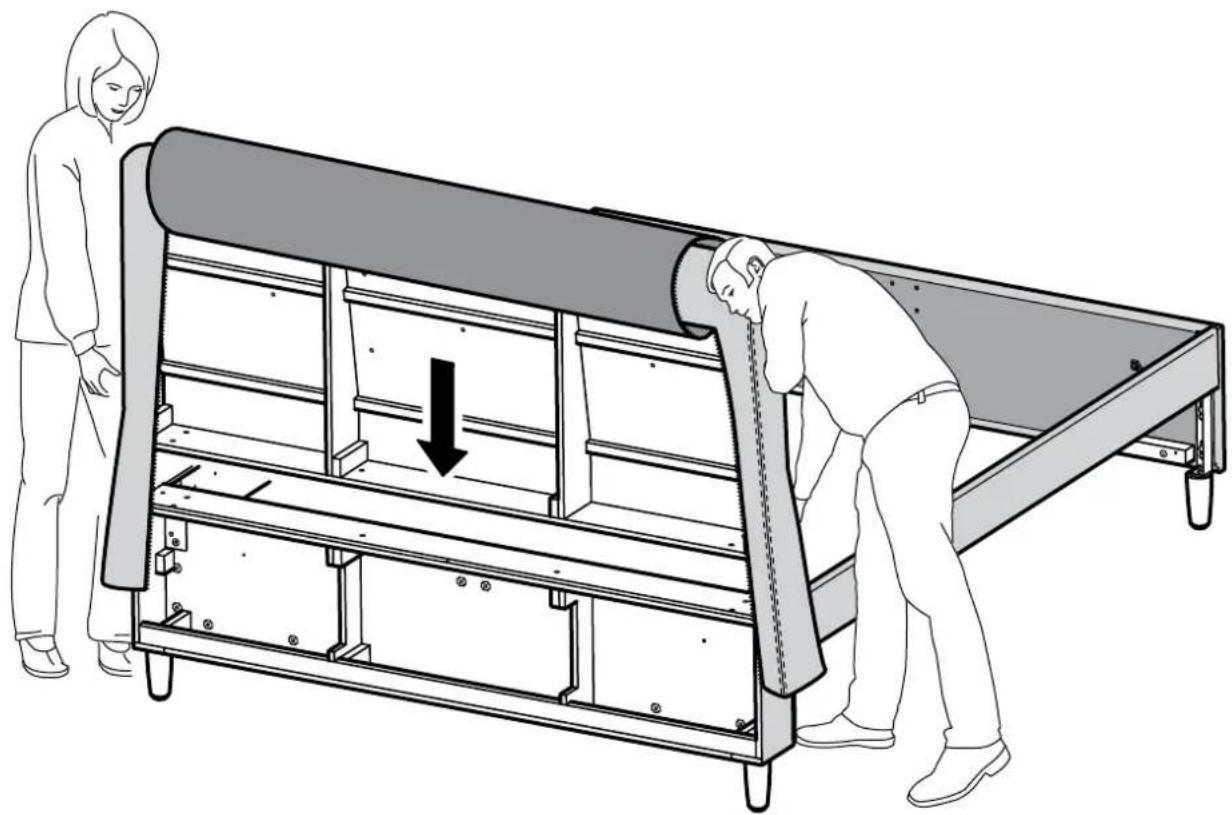 Illustration of two people handling a large cylindrical object on a metal frame, with a downward arrow indicating motion (no text or symbols present)