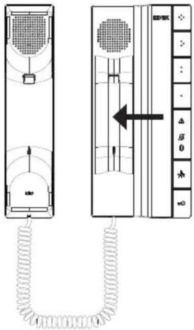 Diagram showing a vertical panel with ventilation grilles and a side panel with a directional arrow, connected by a coiled cable.