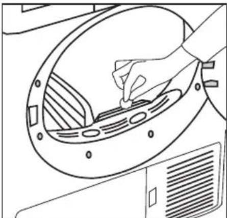 Line drawing of a hand using a tool to clean or adjust a circular component (no text or symbols)