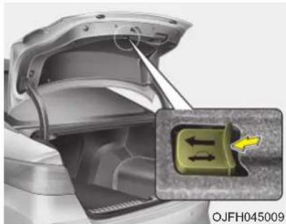 KIA Optima Plug-In Hybrid (2016) - Takaluukun avausvipu hätäti- lanteen varalta (mikäli varusteena) - 1