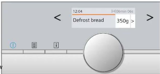 Digital display showing defrost bread status with time, weight, and status indicators