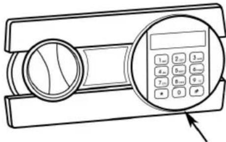 Diagram of a mobile phone with a circular dial and keypad, showing control buttons and an arrow pointing to the keypad.