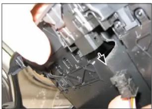 Close-up of mechanical components with a visible crack, no text or symbols present