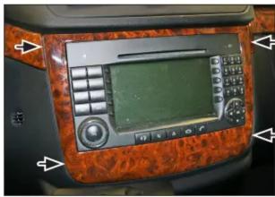 Interior view of a car dashboard with digital display and control panel (no visible text or symbols)
