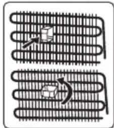 Diagram of two coiled heat exchangers with cooling fans and a valve (no text or labels)